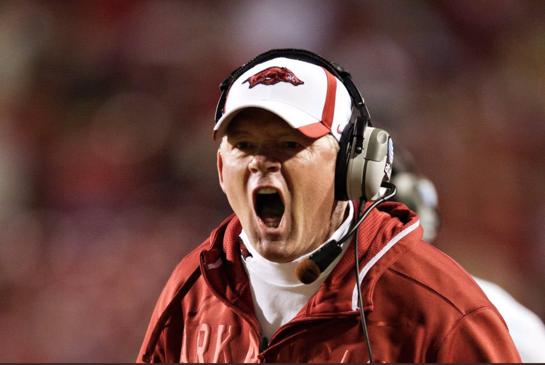 An Arkansas coach yelling from the sideline