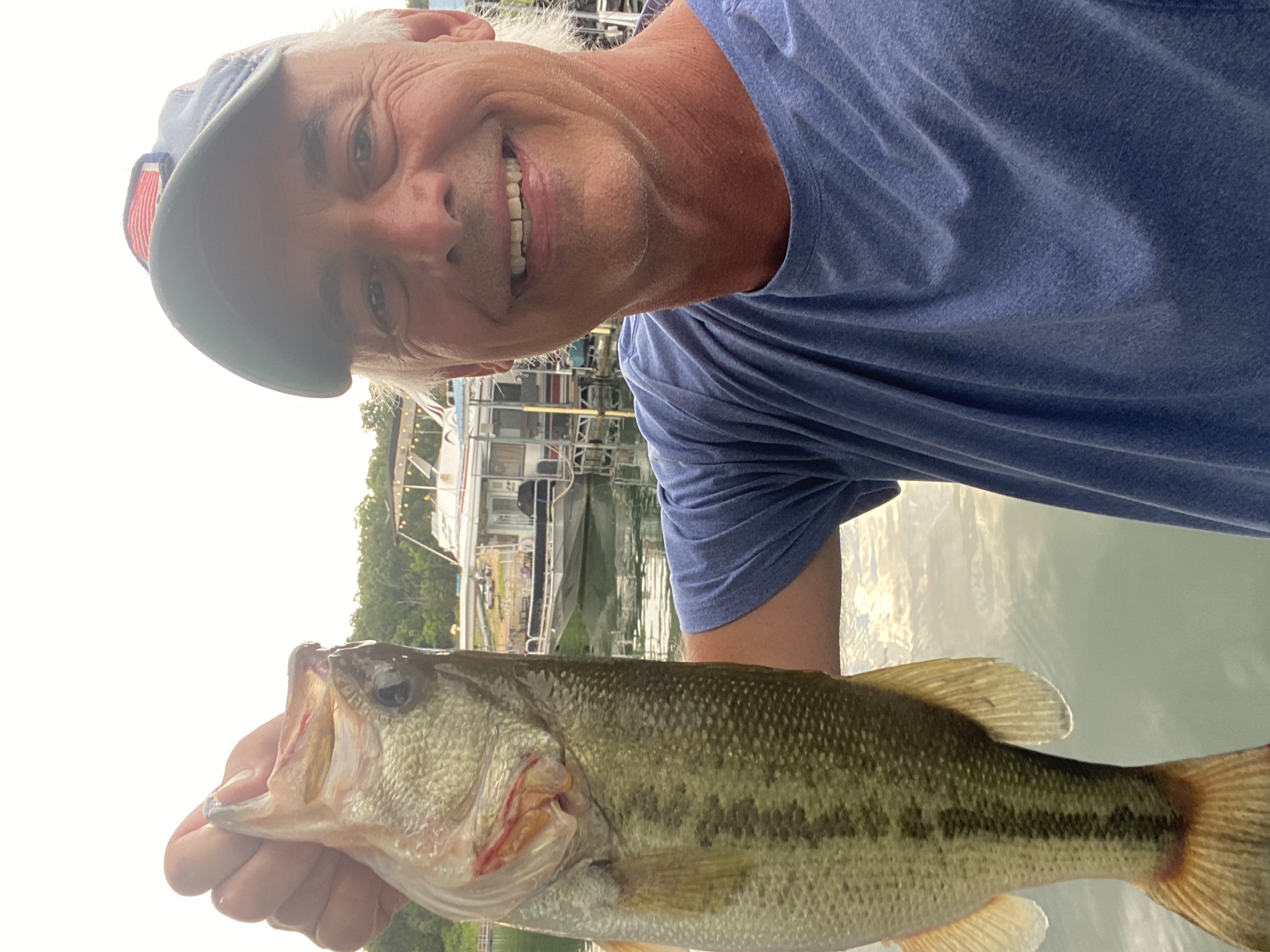 Bill Doshier with a 4-pound Bull Shoals largemouth at the Create.Buzz dock.
