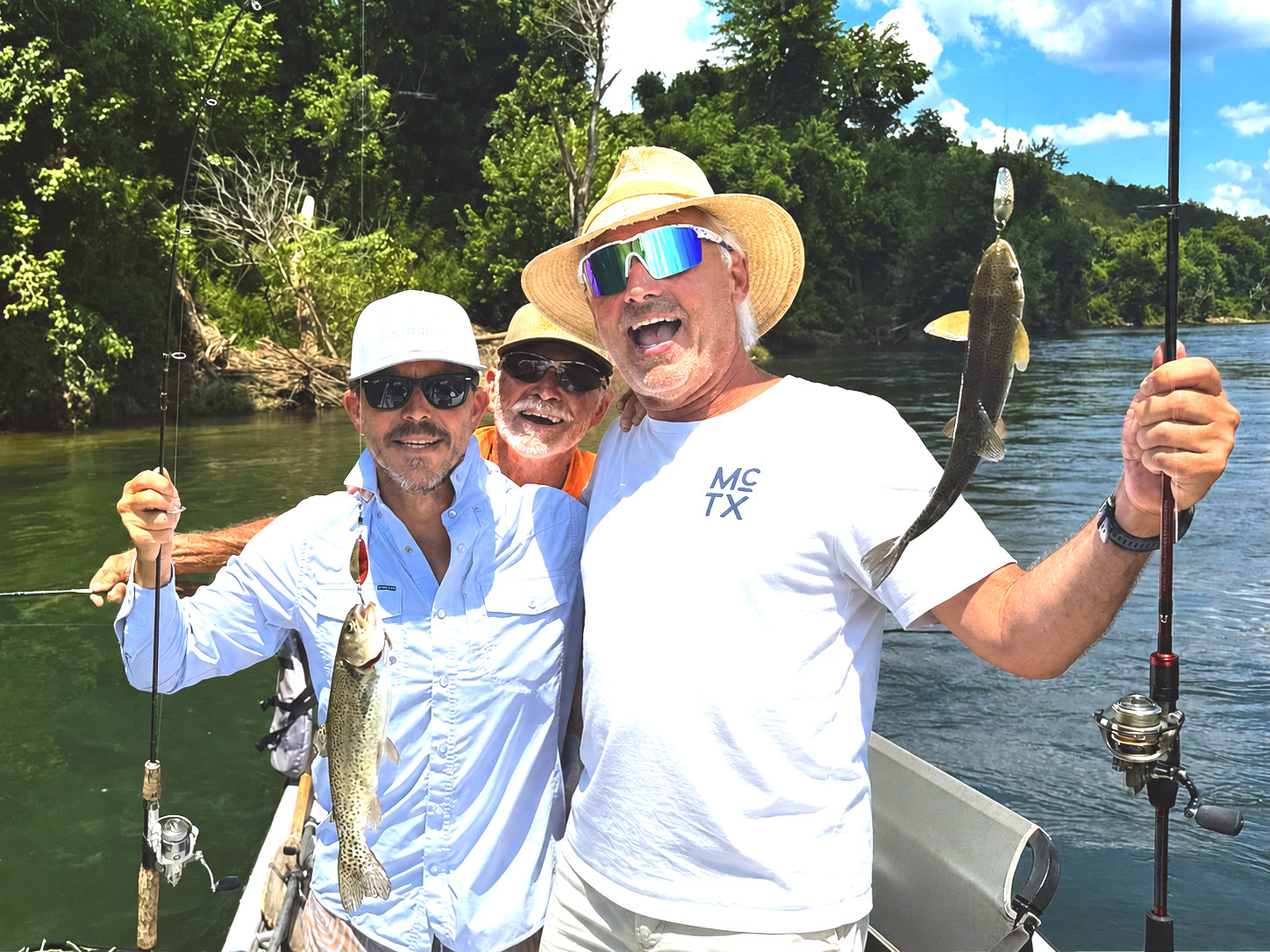 Chad McCutchen, guide Larry Price, and Bill Doshier on a White River float — chunky rainbows all day.